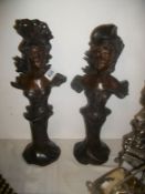A pair of bronze busts of ladies