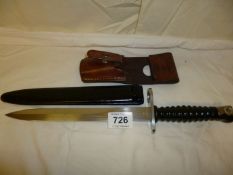 An old Bayonet in leather sheath