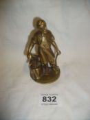 A brass Vulcan blacksmith figure