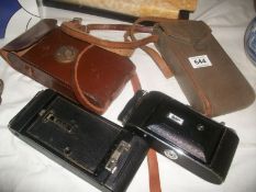 A Kodak 'Ensign' folding camera and one other