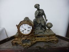 An old French mantel clock surmounted figure