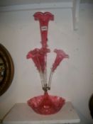 A cranberry glass 4 trumpet epergne