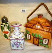 A Cottage ware biscuit barrel, China sugar sifter and a hand painted series ware trinket pot