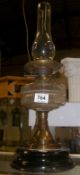 A Victorian oil lamp on pot base