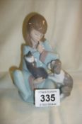 A Lladro figure of a girl with a dog