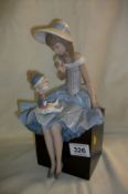 A Lladro figurine 'Susie with her doll'