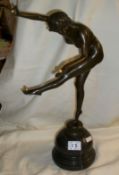 A bronze nude juggler, 45cm