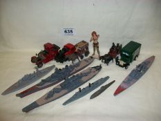 A quantity of die cast battleships and early Yesteryear