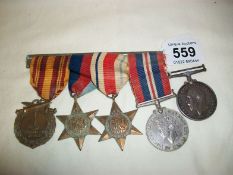 A ribbon bar of WW2 medals including rare Dunkirk for C H Mellows and a WW1 medal