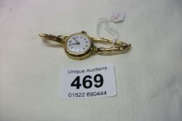 A 9ct gold ladies wrist watch