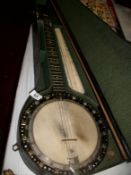 A large cased banjo
