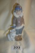 A lladro Eskimo with bear