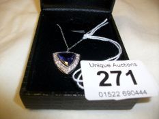 An 18ct gold pendant set 3.5ct Tanzanite and 85pts diamonds