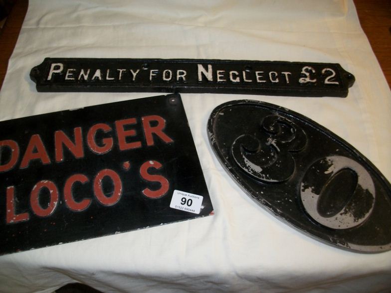 2 Cast Iron signs and an enamel sign