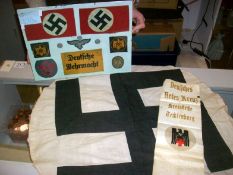 A Nazi flag banner and collage