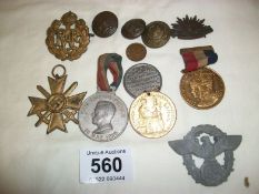 A quantity of medals and badges