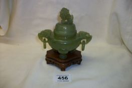 A jade lidded pot surmounted dog of Foo