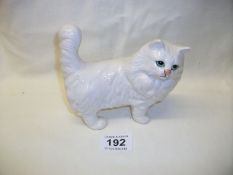 A Beswick white glazed cat