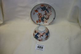 An Imari tea bowl and saucer