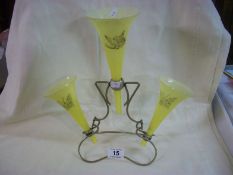 A Webb's silver plated epergne with overlaid yellow glass trumpets decorated with butterflies