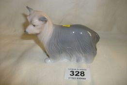 A Lladro long haired terrier