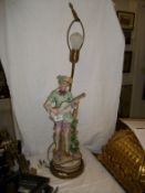 A continental porcelain musician table lamp
