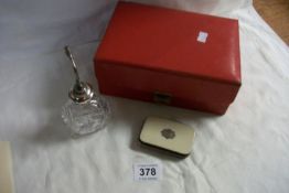 A Red leather ladies jewellery box by Omega with Oxford retailer's stamp, a perfume atomiser and a