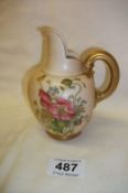 A Royal Worcester hand painted jug