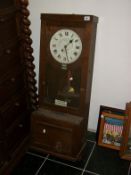 An old clocking in clock by Gledhill Brook, glass a/f