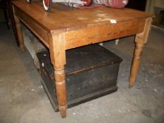 A large pine scrub top table 58" x 34"