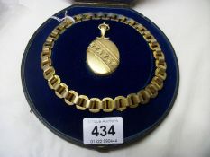 A 15ct gold necklace and pendant