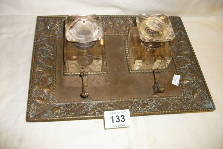 An old brass double ink stand