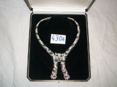 An 18ct white gold millegrain diamond set 'Panther' necklace