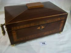 A Regency rosewood work box with brass handles, (28cm x 18cm x 12cm)