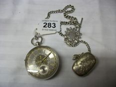 A silver pocket watch, silver vesta and silver fob on silver Albert watch chain