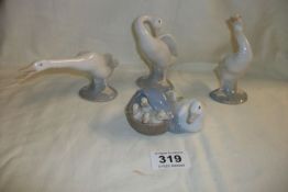 A Lladro duck with ducklings and 3 Lladro geese