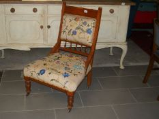 An Edwardian mahogany hall chair