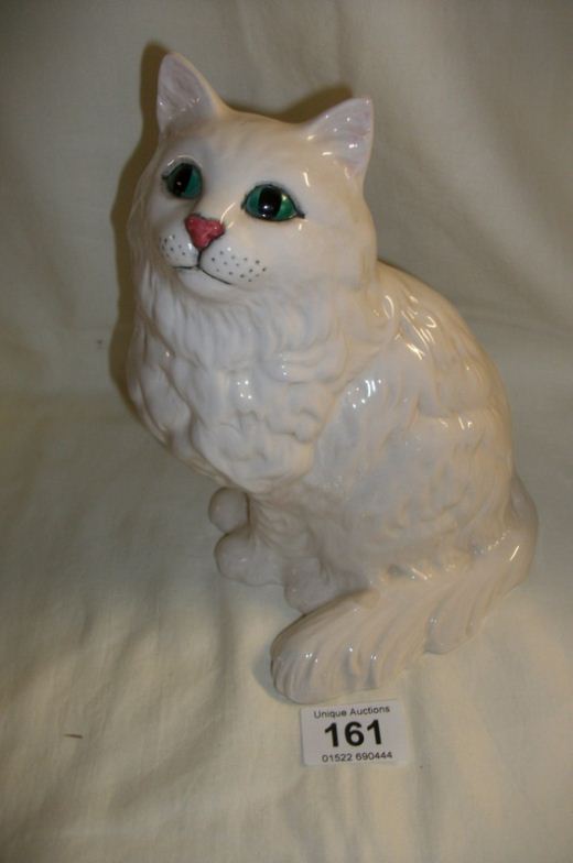 A Beswick white glazed cat