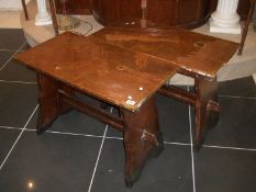 A pair of Edwardian tables with copper tops