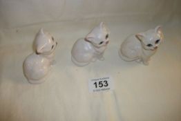 2 Beswick white glazed and one white matt kittens