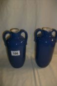 A pair of Royal Doulton stoneware flasks