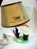 A original Arklow pottery, Ireland Guinness Toucan table lamp (shade a/f)