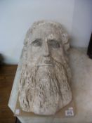 A 19th century sand stone figure head (well weathered)