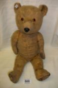 An old jointed teddy bear, neck a/f