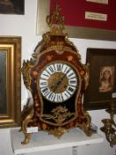 A marquetry inlaid clock