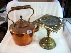 A Victorian copper kettle and a Victorian brass triver