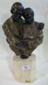 A signed bronze of an elderly couple, 42cm (C Yue)