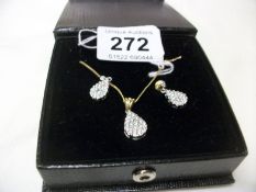 An 18ct gold pendant and earrings set 2ct diamonds