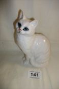 A Beswick white glazed cat, No. 1030