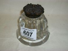 A Victorian glass inkwell